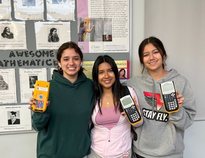 High school students with new calculators. High school students with new calculators.